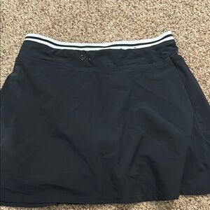 Under Armour Black golf Skirt with White Stripe